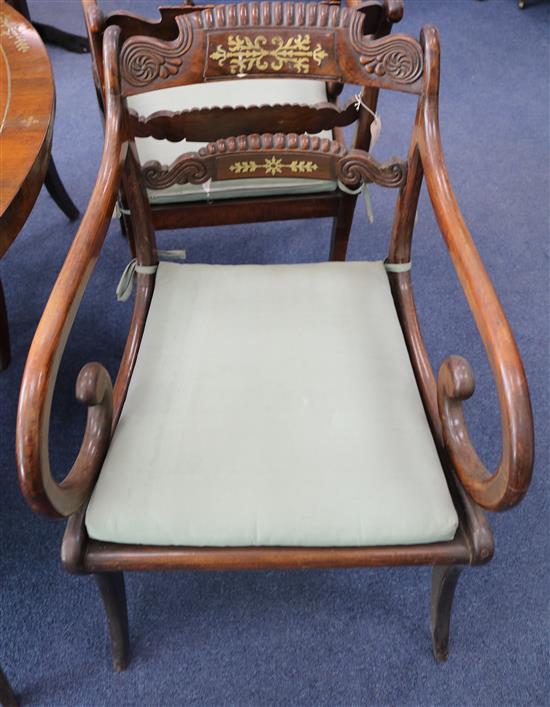 A set of six Regency brass inset simulated rosewood dining chairs